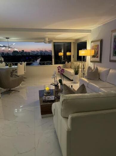 215 N Birch Rd Unit 8C, Fort Lauderdale, FL 33304 - living room featuring light marble finish floors