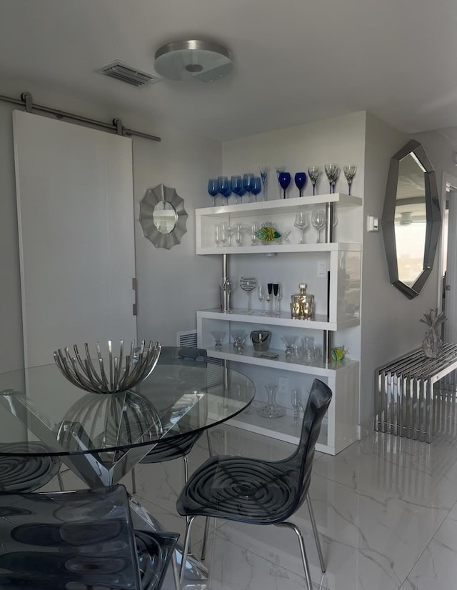 215 N Birch Rd Unit 8C, Fort Lauderdale, FL 33304 - dining room featuring marble finish floors and a barn door
