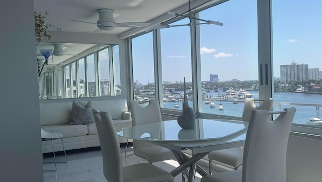 215 N Birch Rd Unit 8C, Fort Lauderdale, FL 33304 - sunroom with a city view, healthy amount of natural light, and a water view
