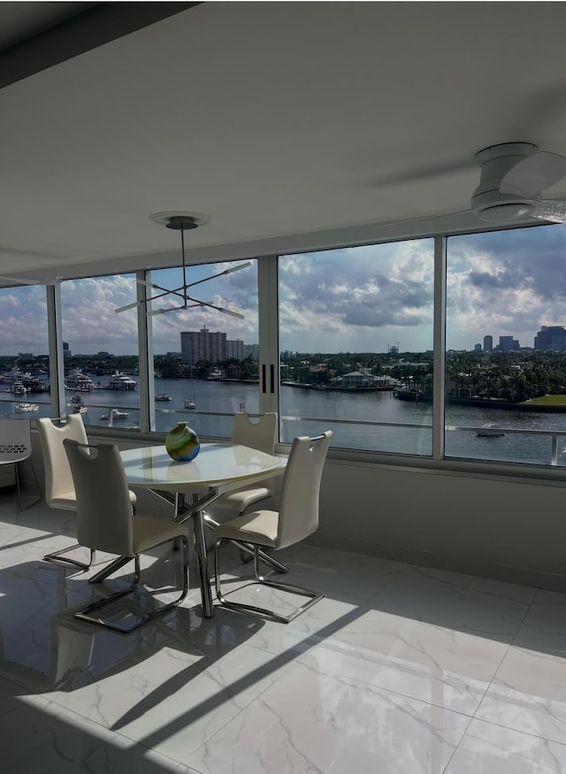 215 N Birch Rd Unit 8C, Fort Lauderdale, FL 33304 - sunroom featuring a water view, a view of city, and healthy amount of natural light