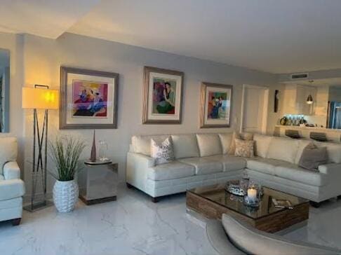 215 N Birch Rd Unit 8C, Fort Lauderdale, FL 33304 - living room with light marble finish floors