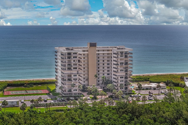 bird's eye view of apartment complex / building and a nearby body of water