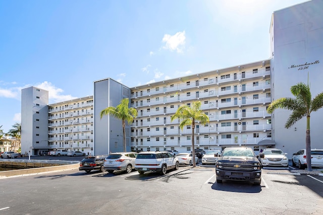 1536 SE 15th Ct Unit 107, Deerfield Beach, FL 33441 - view of apartment building / complex featuring uncovered parking