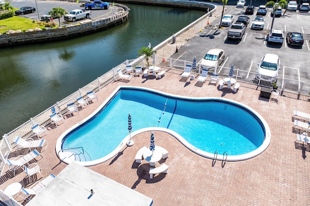 1536 SE 15th Ct Unit 107, Deerfield Beach, FL 33441 - community pool featuring fence, a water view, and a patio
