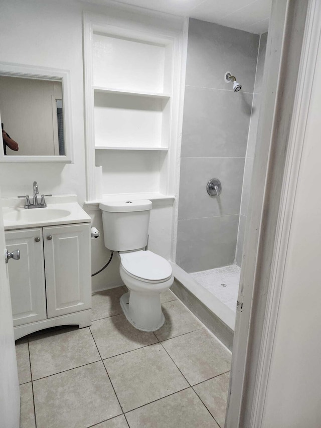 119 S Price St S, Lake Worth, FL 33461 - full bathroom featuring a shower stall, tile patterned floors, vanity, and toilet