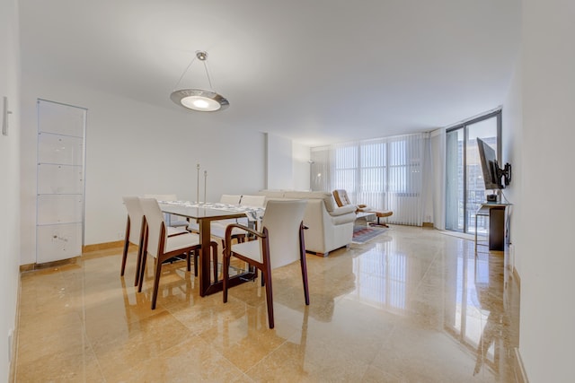 1865 Brickell Ave Unit A611, Miami, FL 33129 - dining area with a wall of windows