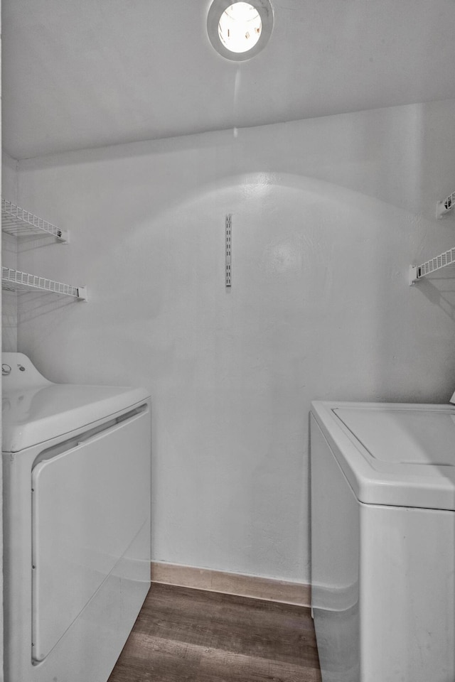 2660 Albatross Rd N Unit 6-C, Delray Beach, FL 33444 - laundry area with separate washer and dryer and wood finished floors