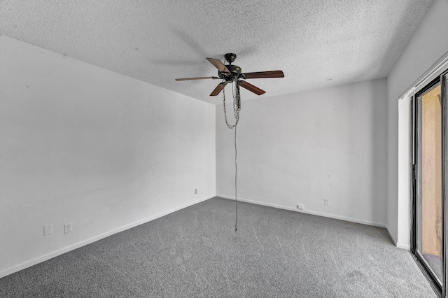 2660 Albatross Rd N Unit 6-C, Delray Beach, FL 33444 - carpeted empty room with a textured ceiling, a ceiling fan, plenty of natural light, and baseboards