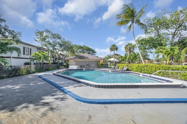 2660 Albatross Rd N Unit 6-C, Delray Beach, FL 33444 - community pool featuring a patio