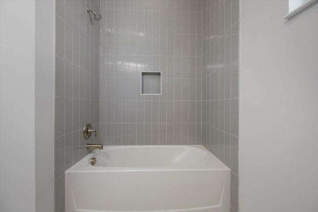 bathroom featuring bathing tub / shower combination