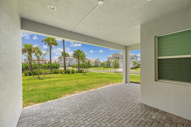 view of patio with a residential view