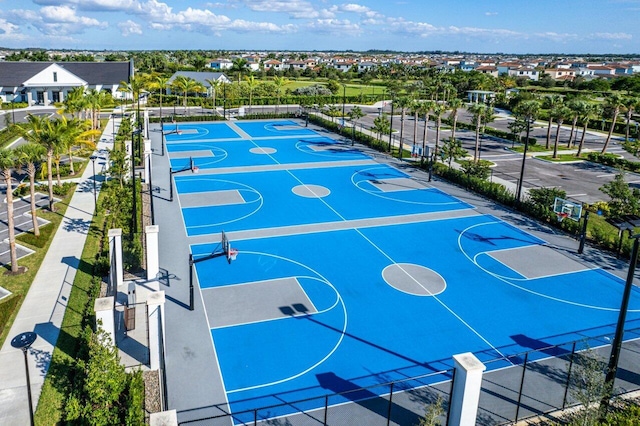 view of sport court featuring community basketball court and fence