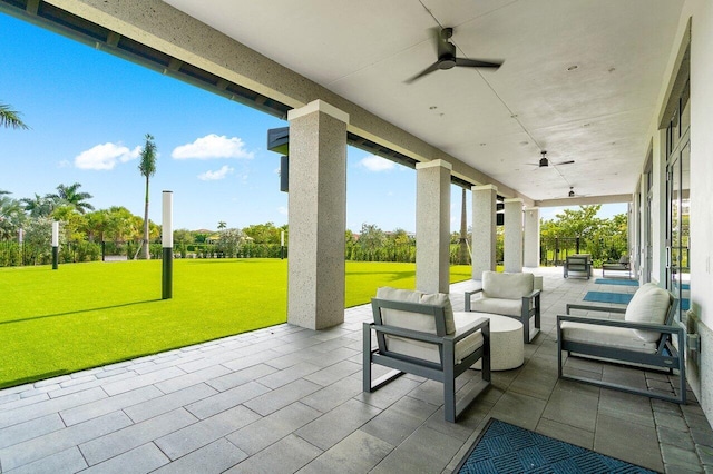 view of patio with a ceiling fan and an outdoor hangout area