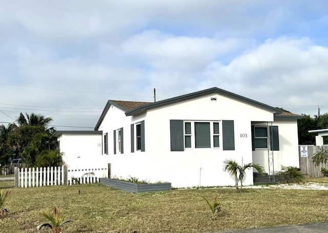 103 SE 5th Ave, Boynton Beach, FL 33435 - view of front of property featuring stucco siding