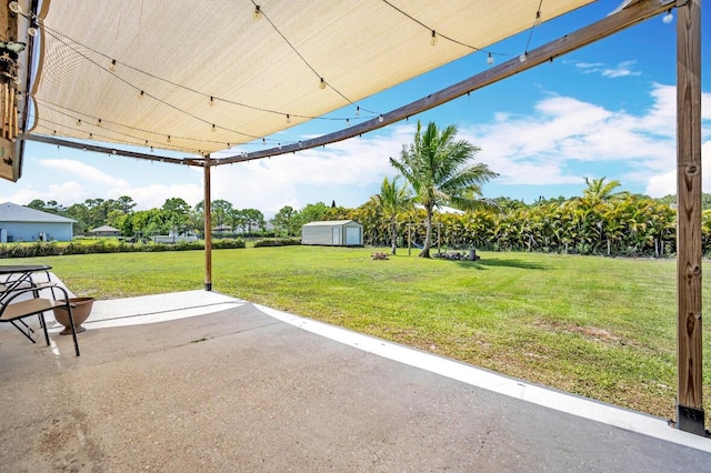 13167 75th Ln N, The Acreage, FL 33412 - view of green lawn featuring a patio