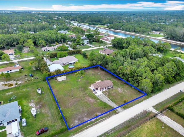 13167 75th Ln N, The Acreage, FL 33412 - aerial view of property's location featuring property boundaries highlighted and a nearby body of water
