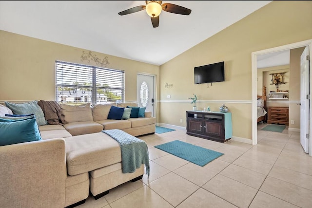 13167 75th Ln N, The Acreage, FL 33412 - living room featuring lofted ceiling, a ceiling fan, light tile patterned floors, and baseboards