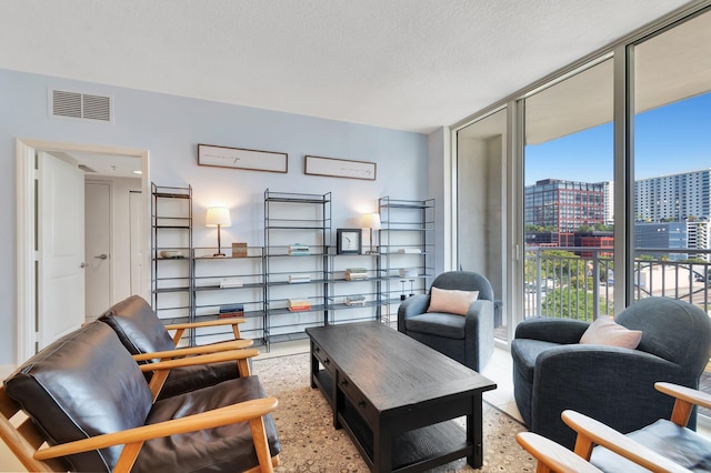 480 Hibiscus St Unit 709, West Palm Beach, FL 33401 - living area with a view of city and floor to ceiling windows