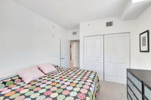 480 Hibiscus St Unit 709, West Palm Beach, FL 33401 - bedroom with light colored carpet and a closet
