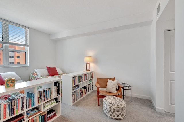 480 Hibiscus St Unit 709, West Palm Beach, FL 33401 - sitting room with carpet flooring and baseboards