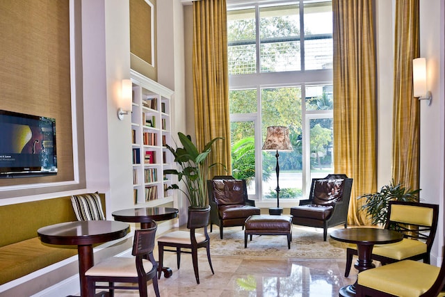 480 Hibiscus St Unit 709, West Palm Beach, FL 33401 - sitting room featuring a high ceiling