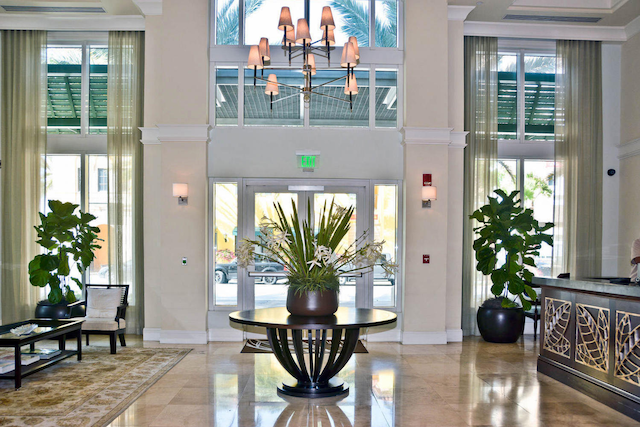 480 Hibiscus St Unit 709, West Palm Beach, FL 33401 - building lobby with a towering ceiling and crown molding