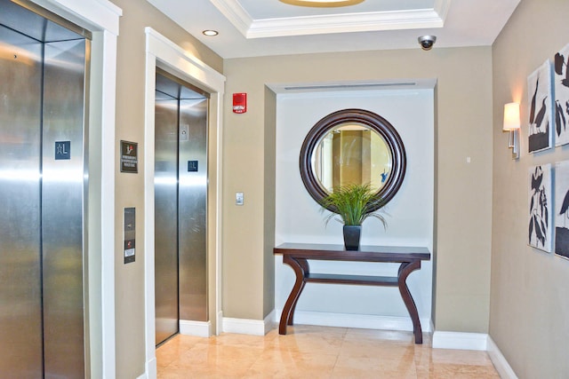 480 Hibiscus St Unit 709, West Palm Beach, FL 33401 - hallway featuring elevator, baseboards, ornamental molding, recessed lighting, and a raised ceiling