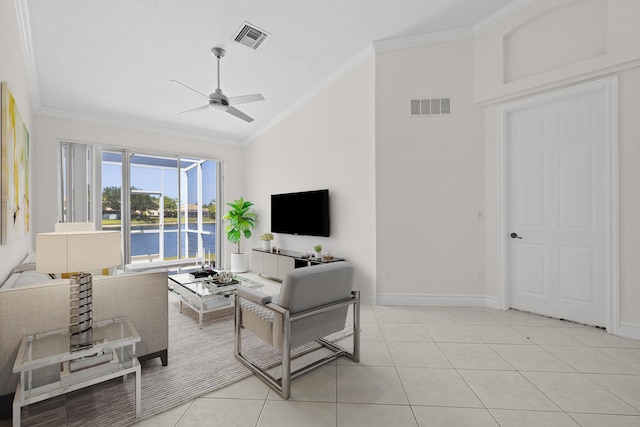 8623 Mangrove Cay, West Palm Beach, FL 33411 - living area featuring lofted ceiling, a ceiling fan, ornamental molding, light tile patterned floors, and baseboards
