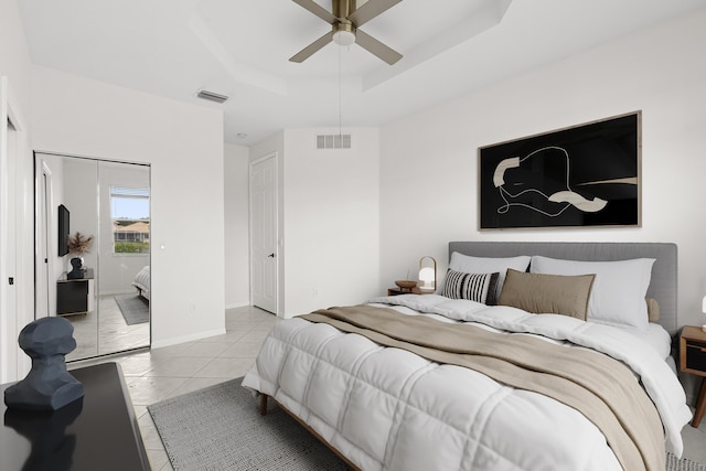 8623 Mangrove Cay, West Palm Beach, FL 33411 - bedroom with a tray ceiling and ceiling fan