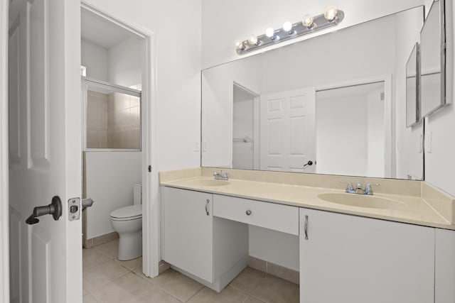 8623 Mangrove Cay, West Palm Beach, FL 33411 - full bath with tile patterned flooring, toilet, and double vanity