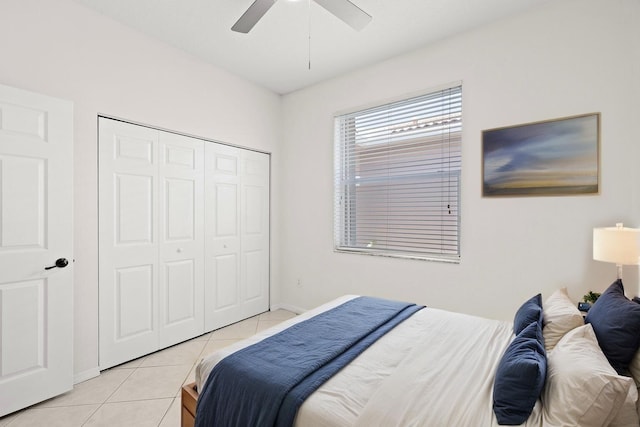 8623 Mangrove Cay, West Palm Beach, FL 33411 - bedroom featuring light tile patterned floors, a closet, a ceiling fan, and baseboards