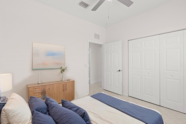 8623 Mangrove Cay, West Palm Beach, FL 33411 - bedroom featuring light tile patterned floors, a closet, and a ceiling fan