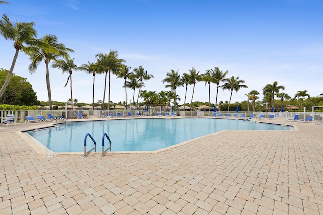 8623 Mangrove Cay, West Palm Beach, FL 33411 - community pool with fence and a patio area