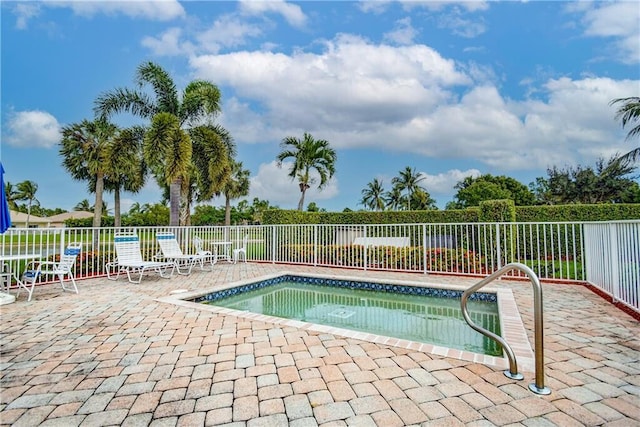 8623 Mangrove Cay, West Palm Beach, FL 33411 - view of pool featuring fence, a patio area, and a swimming pool