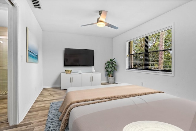2920 SW 22nd Cir Unit C2, Delray Beach, FL 33445 - bedroom with light wood finished floors, baseboards, and ceiling fan