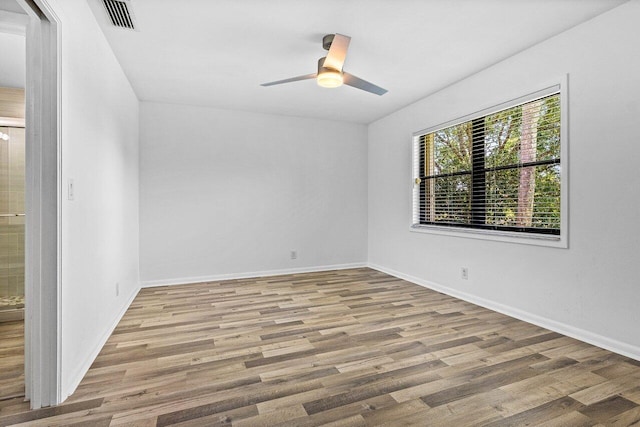2920 SW 22nd Cir Unit C2, Delray Beach, FL 33445 - spare room with wood finished floors, ceiling fan, and baseboards