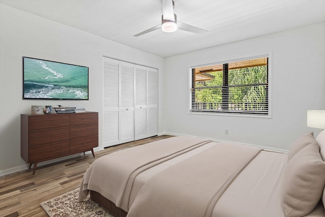 2920 SW 22nd Cir Unit C2, Delray Beach, FL 33445 - bedroom with light wood-style flooring, a closet, baseboards, and ceiling fan