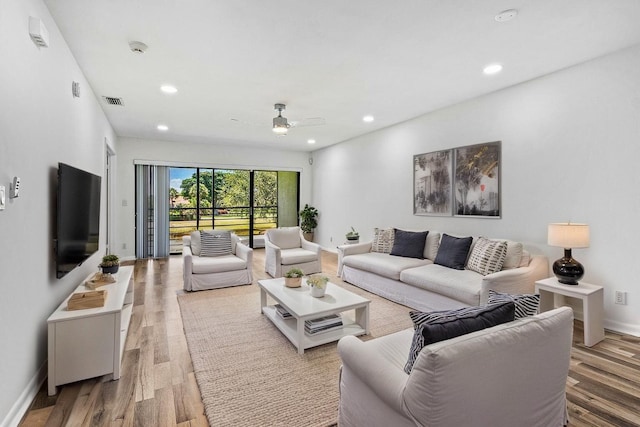 2920 SW 22nd Cir Unit C2, Delray Beach, FL 33445 - living room featuring wood finished floors, recessed lighting, a ceiling fan, and baseboards