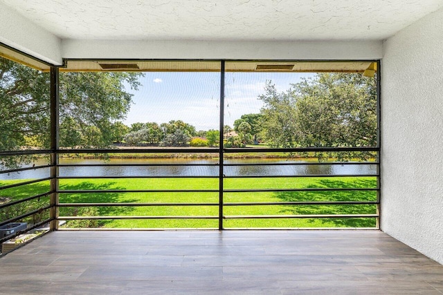 2920 SW 22nd Cir Unit C2, Delray Beach, FL 33445 - unfurnished sunroom with a water view