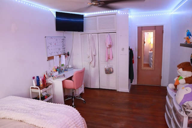 bedroom featuring wood finished floors, a closet, and ceiling fan
