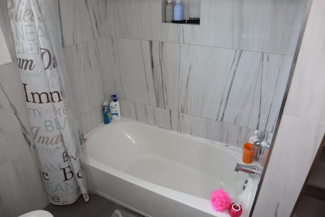 full bathroom with a bathtub and curtained shower