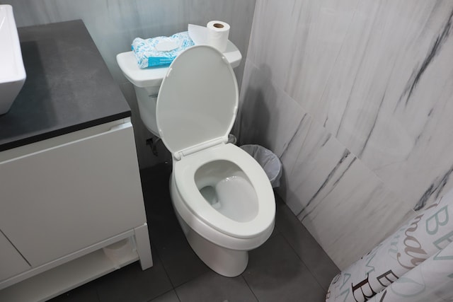 bathroom featuring tile patterned floors and toilet
