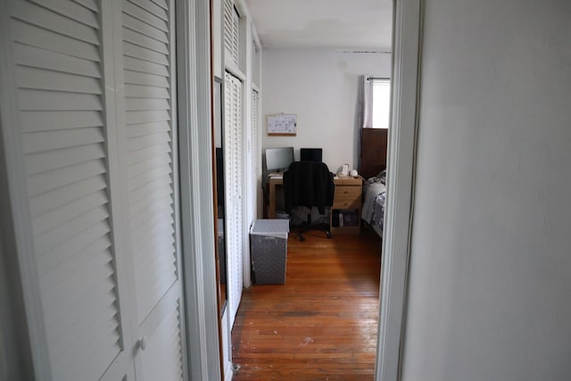 hall featuring wood finished floors and an office area