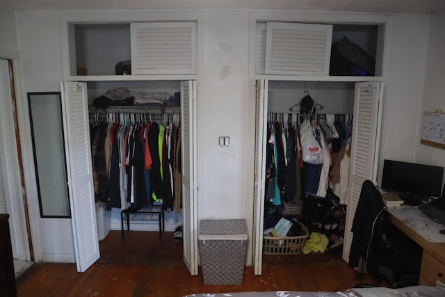 bedroom featuring wood finished floors and an office area