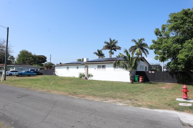 view of front of home with solar panels