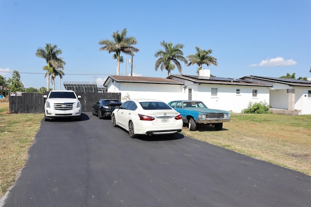 360 Kismet Ave, Pahokee, FL 33476 - single story home with roof mounted solar panels
