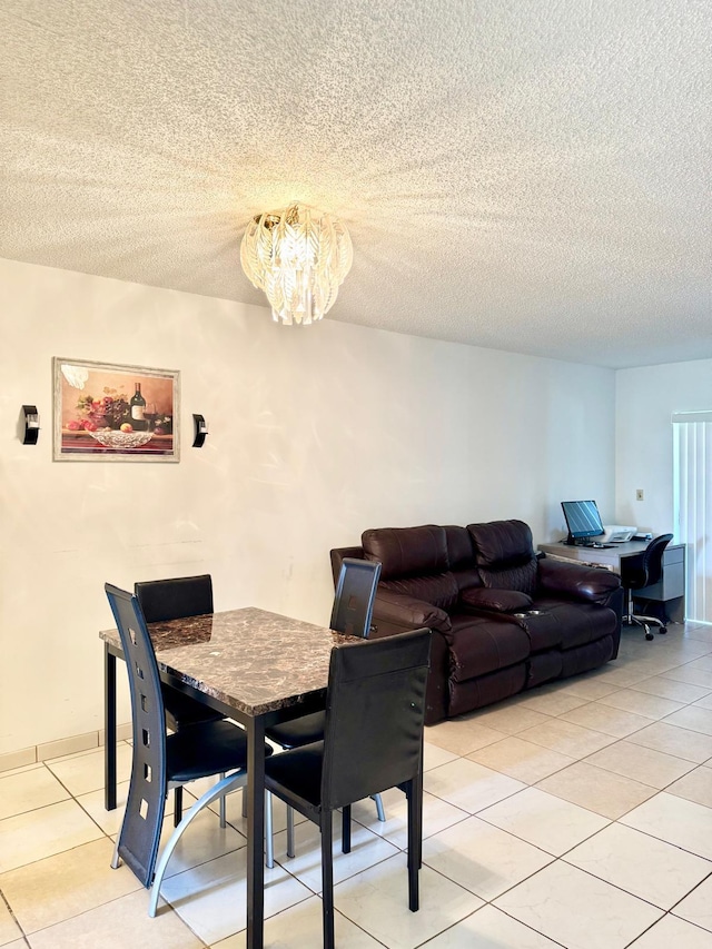 8305 NW 61st St Unit C309, Tamarac, FL 33321 - dining area featuring light tile patterned floors, a chandelier, a textured ceiling, and an office area