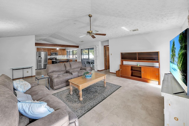 1290 SE Mcfarlane Ave, Port Saint Lucie, FL 34952 - living area with ceiling fan, lofted ceiling, and a textured ceiling