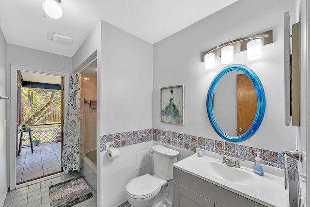 1290 SE Mcfarlane Ave, Port Saint Lucie, FL 34952 - full bath with tile patterned floors, vanity, toilet, and shower / tub combo