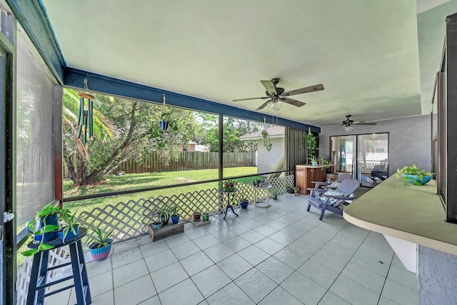 1290 SE Mcfarlane Ave, Port Saint Lucie, FL 34952 - sunroom / solarium featuring a ceiling fan